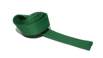 A picture of taekwondo belt on white background with selective focus photo