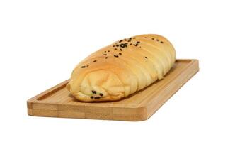 Traditional Indonesian snack called, chocolate banana bread which is bread filled with banana and chocolate jam served on a plate isolated on a white background photo