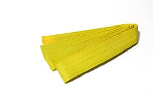A picture of taekwondo belt on white background with selective focus photo