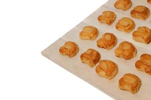 peanut almond cookies topped with sliced peanuts. photo