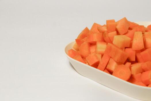 Chopped Carrot Cubes, Vegetable Pattern Background photo