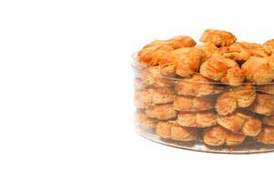 peanut almond cookies topped with sliced peanuts. photo