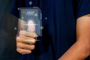 Man scanning fingerprint on virtual screen. Fingerprint identification to access personal data. photo