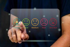 Man gives rating to service experience on virtual screen. Customer review satisfaction feedback concept. photo