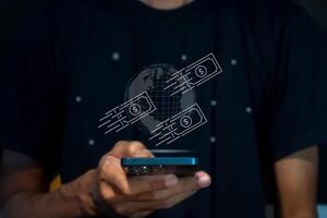 A man using smart phone to conduct online mobile banking, financial transaction or online payment. Money transfer via smart phone concept. photo