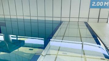 staircase with railings to enter the pool with blue water. staircase with railings to enter the pool with blue water. Sports pool depth measuring scale photo