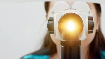 Close-up Ophthalmic laser system. Laser treatmnet for myopia. The concept of ophthalmology and medicine. Medical attendance at the optometrist in a bright modern clinic photo
