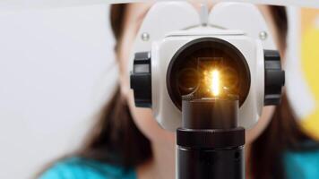 Close-up Ophthalmic laser system. Laser treatmnet for myopia. The concept of ophthalmology and medicine. Medical attendance at the optometrist in a bright modern clinic photo