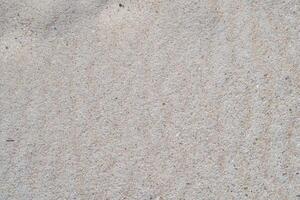 Abstract sand background on the beach in summer photo
