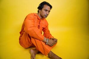 Contemplative Man handcuffed seated photo