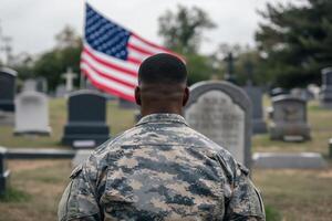 Diverse military man in uniform stands alone photo