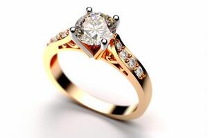 Diamond ring isolated on white Engage solitaire style ring. Yellow Gold Solitaire Diamond Ring isolated on white background. photo