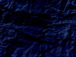 Abstract wrinkled or Free photo crumpled blue or purple paperboard or empty canvas or paper surface or fabric stain background.