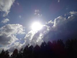 Sun Shining Through Clouds photo