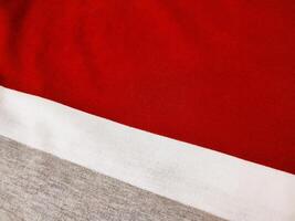 The texture and background of the fabric is white, gray and red photo