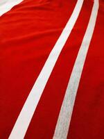 The texture and background of the fabric is white, gray and red photo