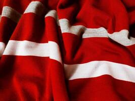 The texture and background of the fabric is white, gray and red photo
