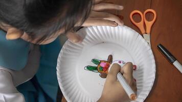 Kids drawing with colorful wax crayons Wooden background Supplies tools table top view flat lay photo