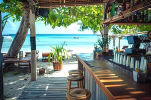 Tropical beach bar with ocean view on a sunny day. Empty bar counter and stools under lush greenery, overlooking the clear blue sea. Perfect spot for relaxing and enjoying the summer vibes. photo