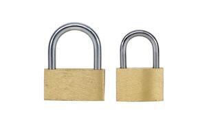 Two shiny gold padlocks isolated on white background photo