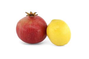 Pomegranate and lemon isolated on white background photo