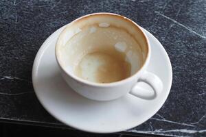 top view of empty coffee cup on table , photo