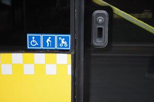 Enhancing accessibility with yellow checkerboard symbols for public transportation icon display photo