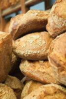 Bread baguettes in a basket in the baking shop photo