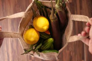 fresh vegetable in a shopping bag , high angle view photo