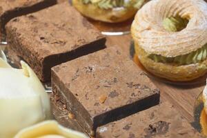 Closeup of assorted pastries and brownies, a delicious selection for sweet cravings photo