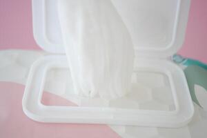 Cleansing wet wipes on table with copy space photo