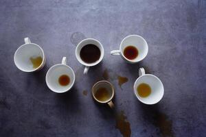 top view of coffee spilled on a black background photo