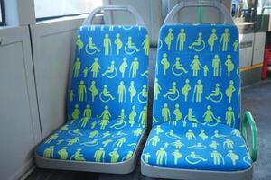 disable priority sit in a public bus , photo