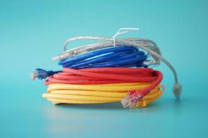 Stack of colorful elastic rubber bands on table photo