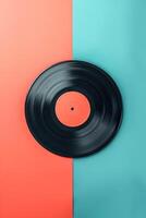 vertical image top view one vinyl record on blue and red background flatlay in retro style photo