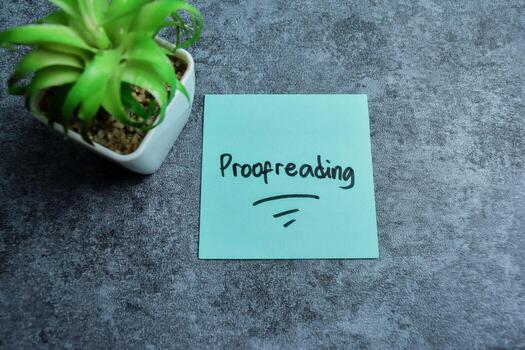 Concept of Proofreading write on sticky notes isolated on Wooden Table. photo