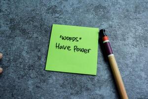 Concept of words Have Power write on sticky notes isolated on Wooden Table. photo
