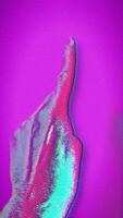 Psychedelic hand counting down from three, two, one in a trippy pink and blue colors video