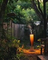 A high-tech device emitting a frequency to repel and block bugs, serving as a deterrent in a backyard during a summer evening photo