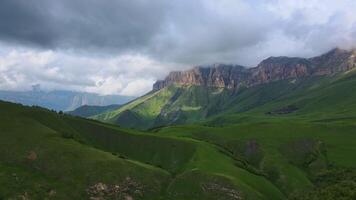 Majestic mountains with lush greenery create a peaceful and breathtaking scenery video