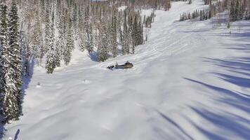 Emergency response needed for helicopter crash in snowy mountains, risky terrain rescue operation video