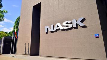 Warsaw, Poland. 18 May 2024. Modern office building with the NASK sign. photo