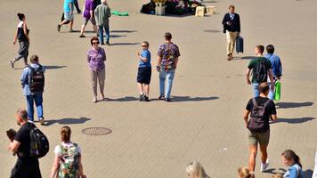 Warsaw, Poland. 8 June 2024. Crowd of people on Patelnia square in centrum city. The colloquial name. An important communication point on the city map with residents, tourists and buildings. photo