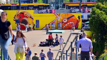 Warsaw, Poland. 8 June 2024. Crowd of people on Patelnia square in centrum city. The colloquial name. An important communication point on the city map with residents, tourists and buildings. photo