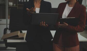 Team of business people working together in the meeting room office, teamwork background charts and graphs banner, double exposure successful teamwork,business planning concept. photo