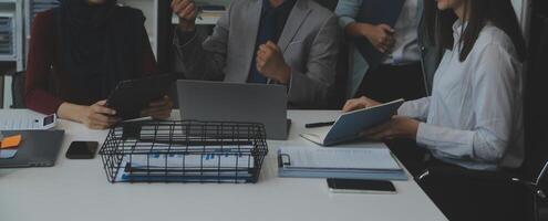 Team of business people working together in the meeting room office, teamwork background charts and graphs banner, double exposure successful teamwork,business planning concept. photo