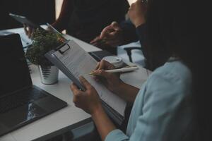 Team of business people working together in the meeting room office, teamwork background charts and graphs banner, double exposure successful teamwork,business planning concept. photo