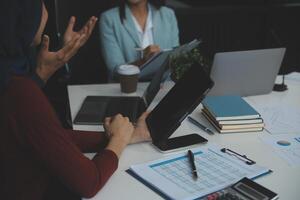 Team of business people working together in the meeting room office, teamwork background charts and graphs banner, double exposure successful teamwork,business planning concept. photo