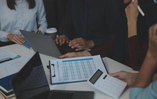 Team of business people working together in the meeting room office, teamwork background charts and graphs banner, double exposure successful teamwork,business planning concept. photo