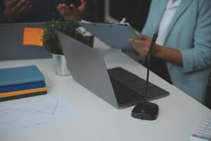 Team of business people working together in the meeting room office, teamwork background charts and graphs banner, double exposure successful teamwork,business planning concept. photo